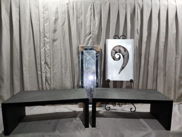 Two faux leather coffee tables with mirror and art piece