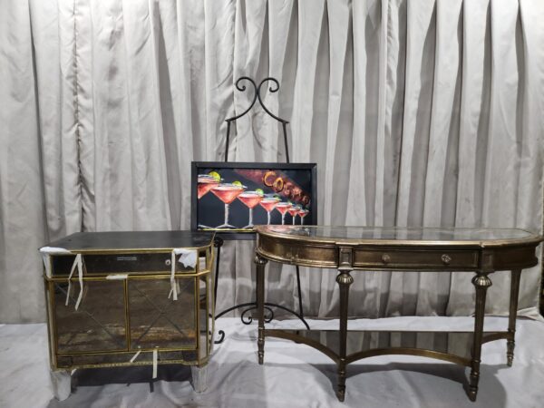 Sofa/Entry way table with artwork and glass chest
