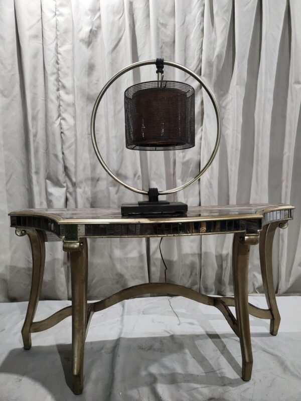 Entry way glass and pewter tone table with lamp